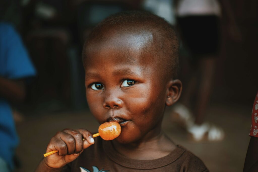 kid with lollipop